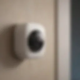 Close-up view of a Blink home security camera mounted on a wall.