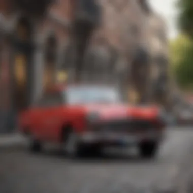 Sleek red classic car parked in a vintage city street